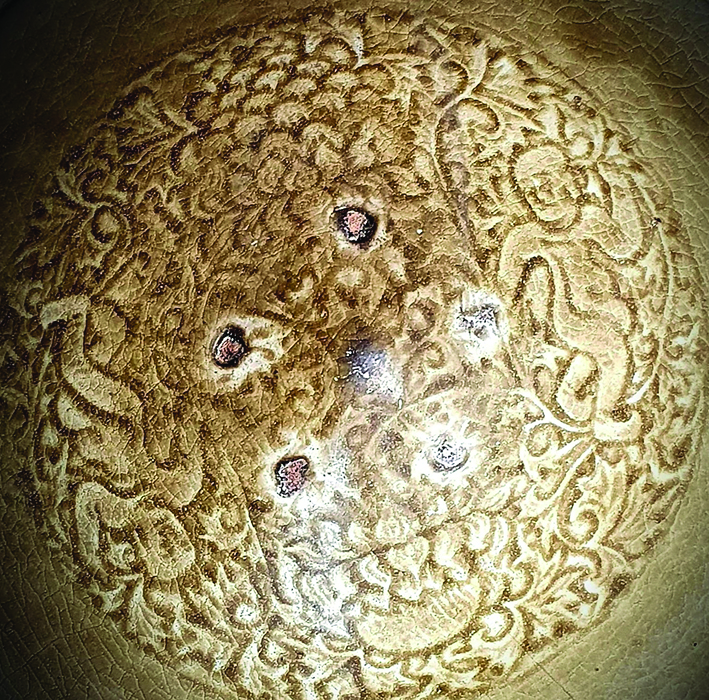 Hình tượng trẻ thơ trang trí trên đồ gốm thời Lý Trần